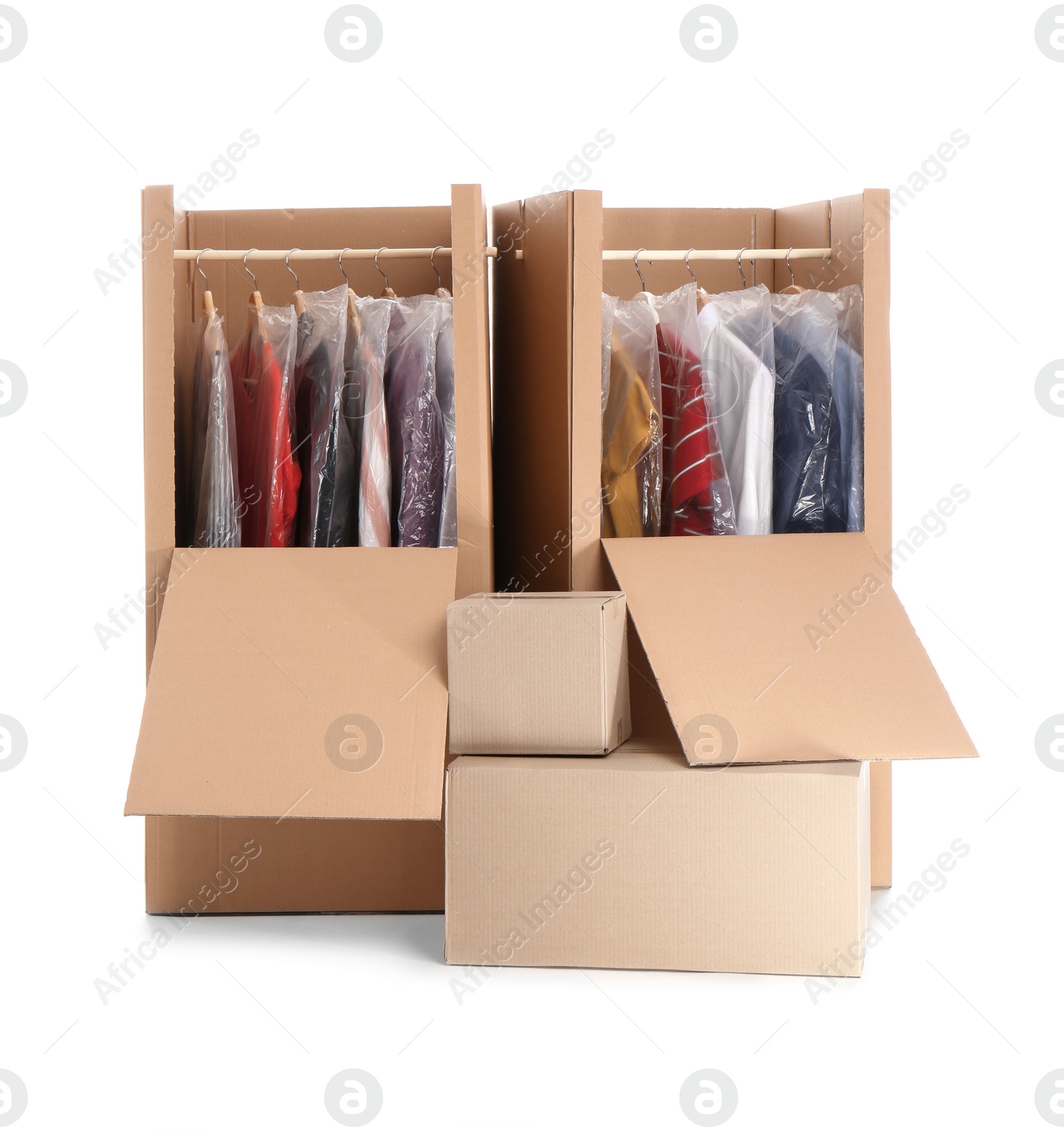 Photo of Wardrobe boxes with clothes on white background