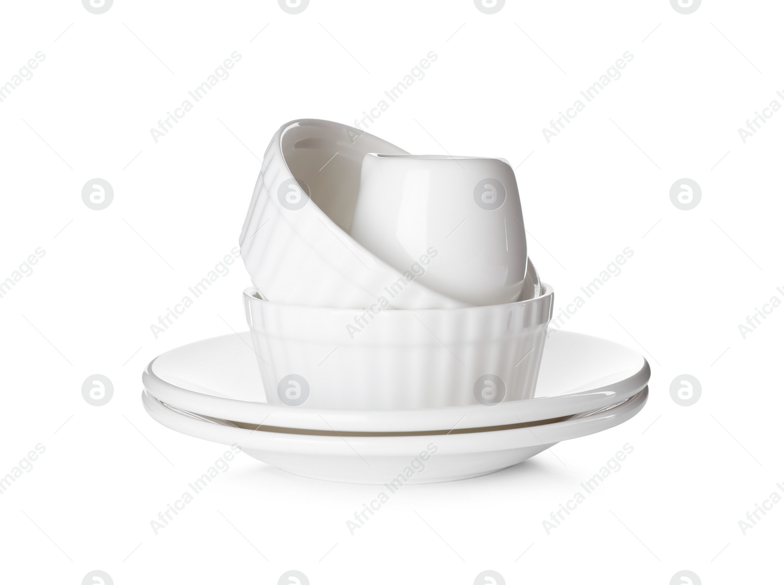 Photo of Stack of ceramic dishware on white background