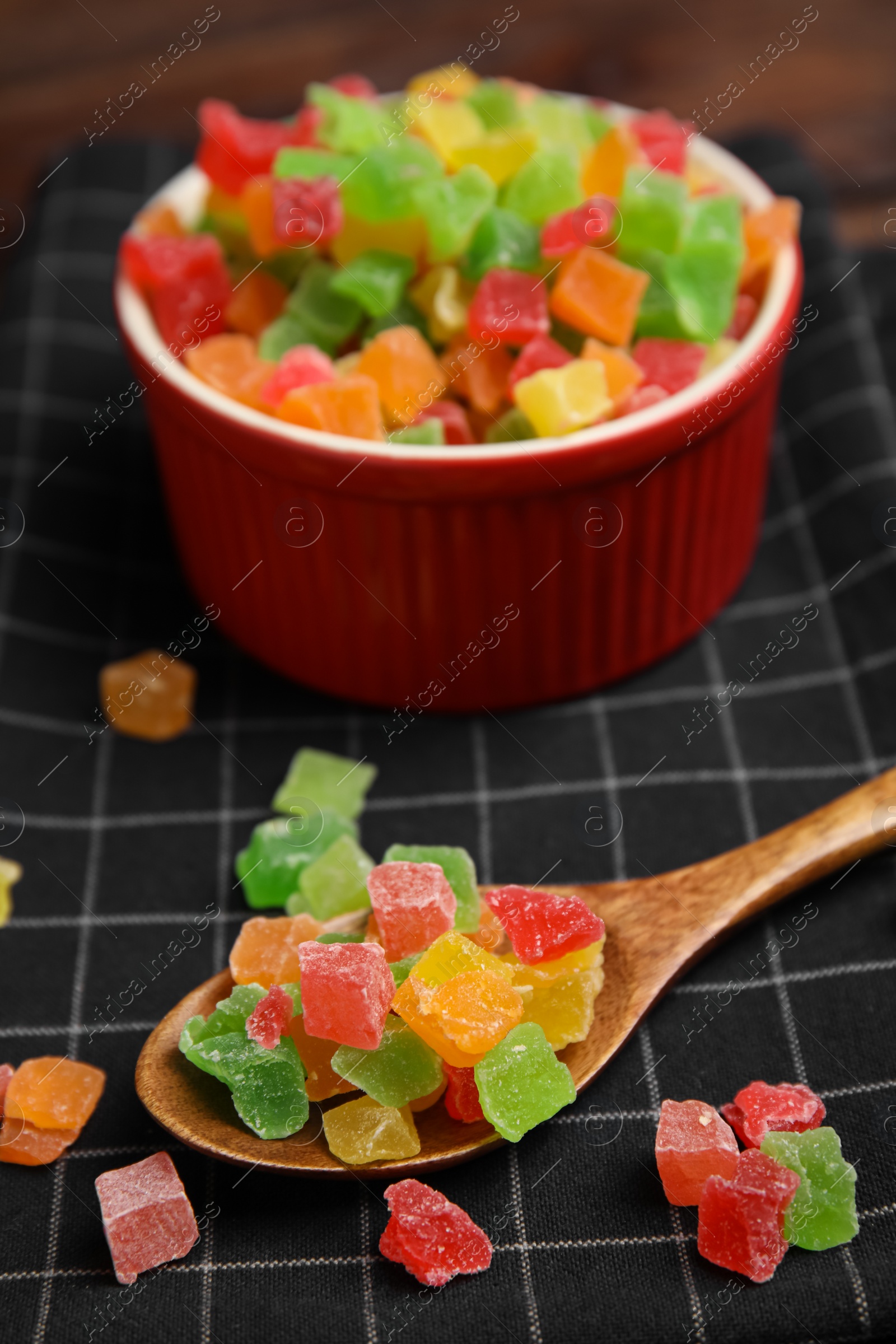 Photo of Mix of delicious candied fruits on table, closeup
