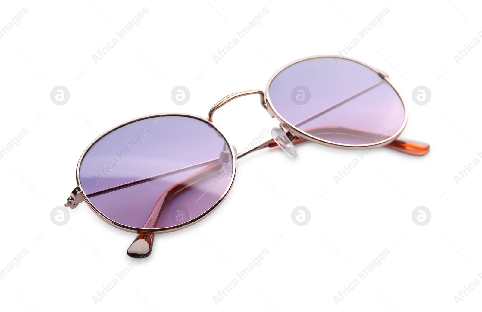 Photo of Beautiful stylish protective sunglasses isolated on white