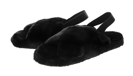 Photo of Pair of soft slippers with black fur on white background