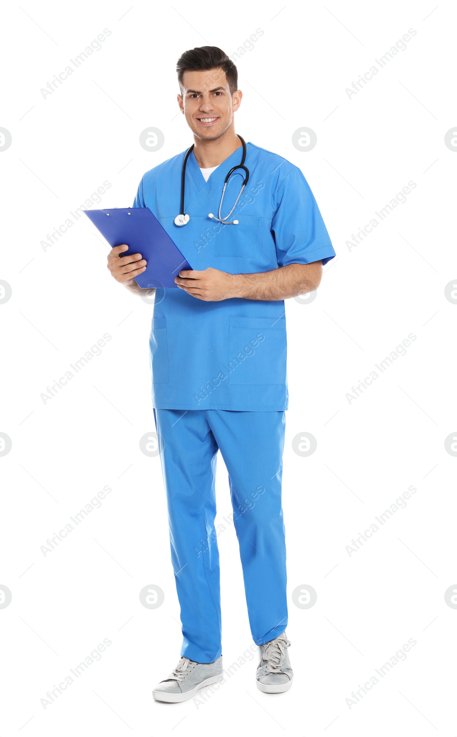 Photo of Full length portrait of medical doctor with clipboard and stethoscope isolated on white