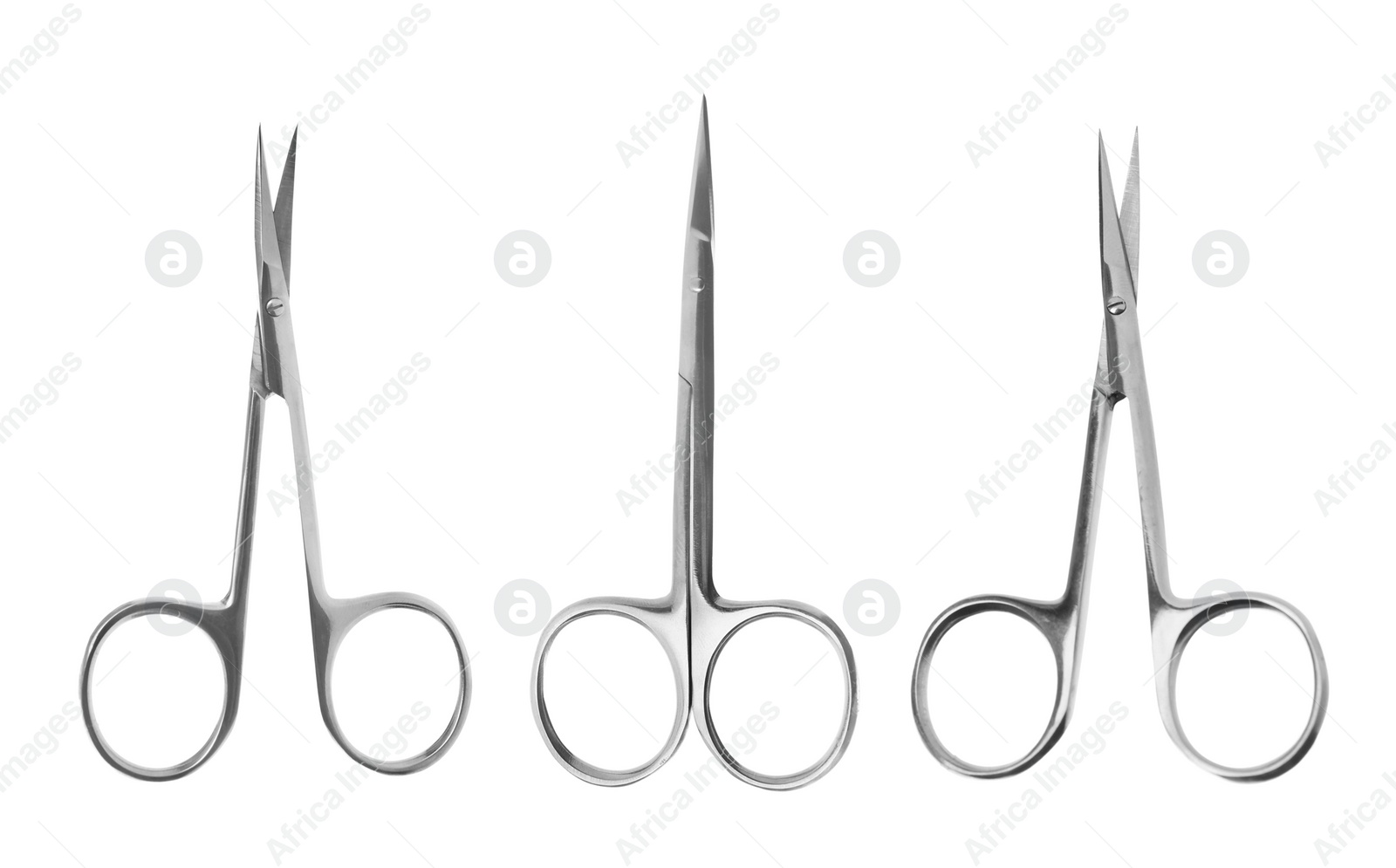 Image of Set of manicure scissors on white background, top view