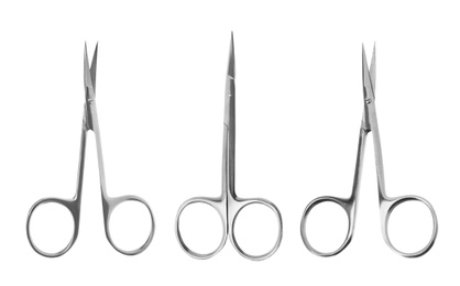 Image of Set of manicure scissors on white background, top view