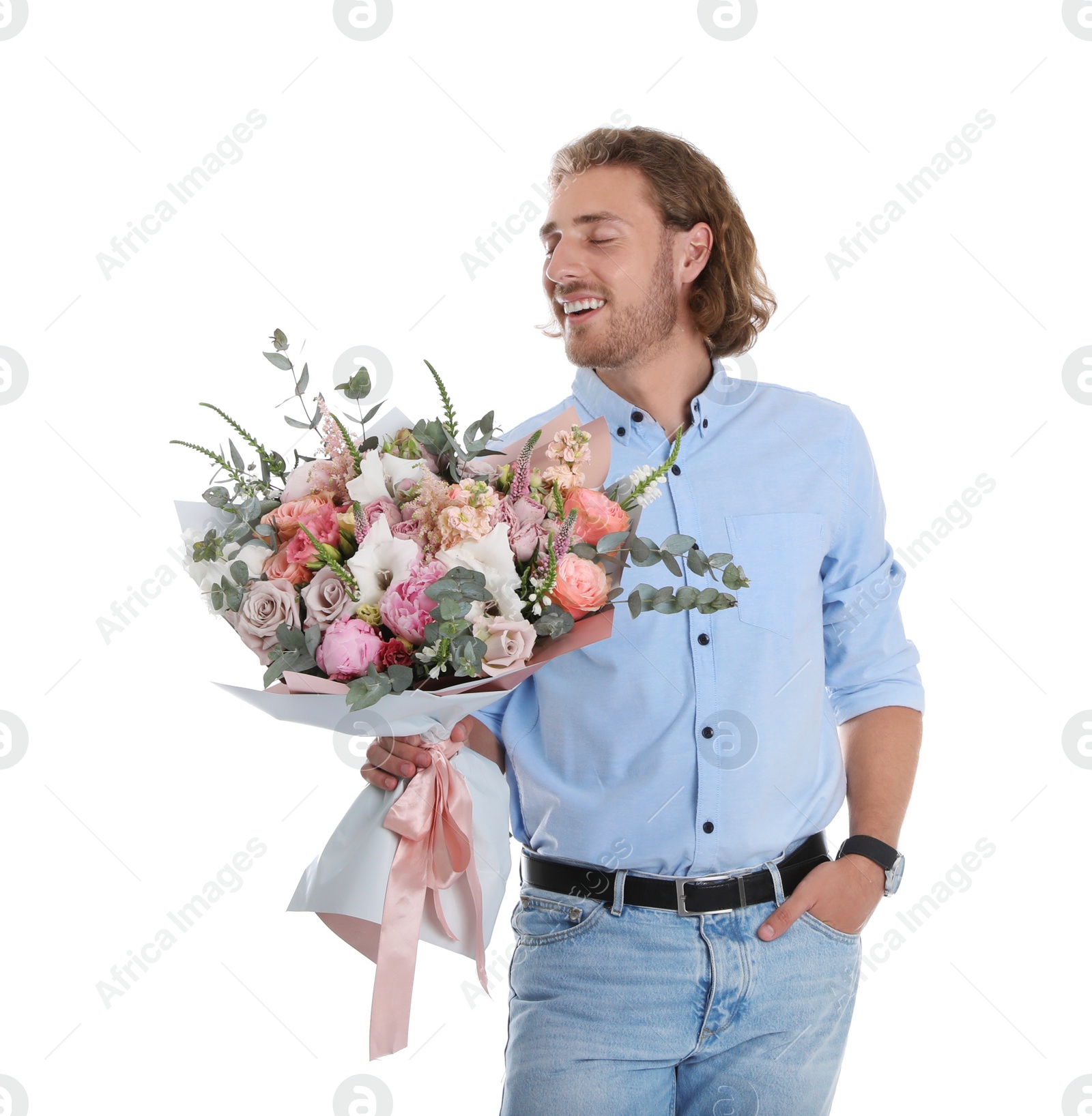 Photo of Young handsome man with beautiful flower bouquet on white background