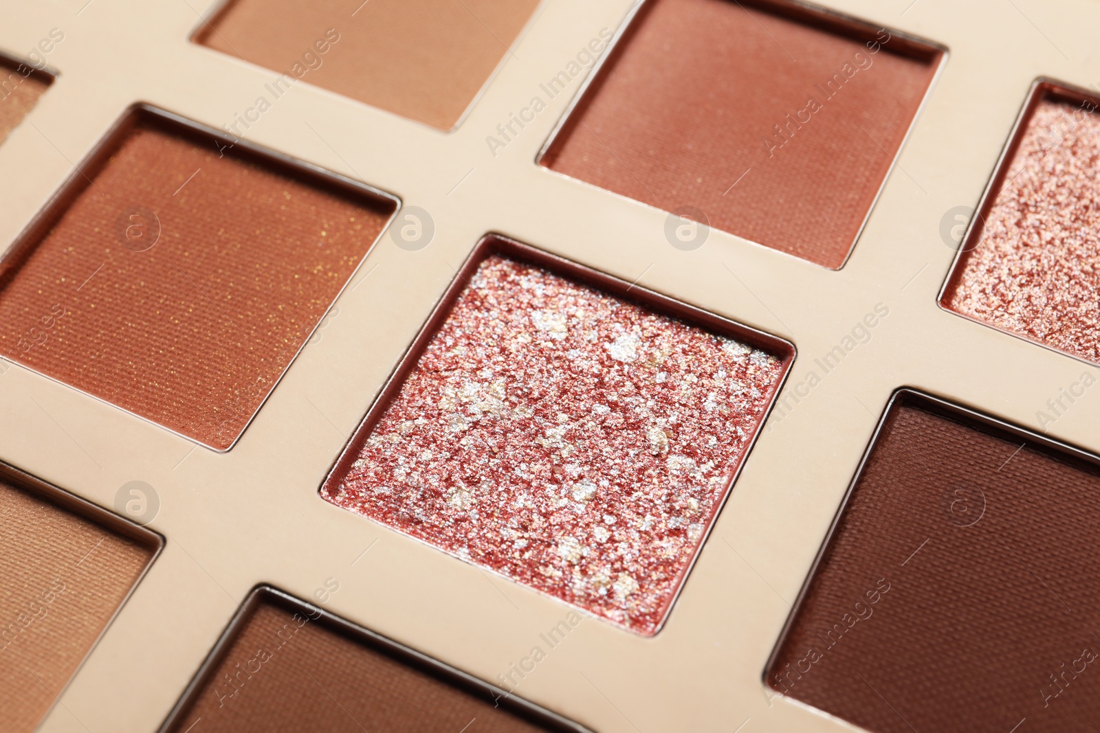 Photo of Beautiful eye shadow palette as background, closeup