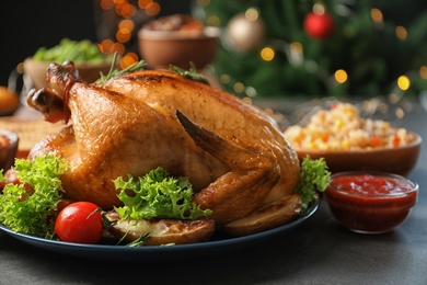 Traditional festive dinner with delicious roasted turkey served on table