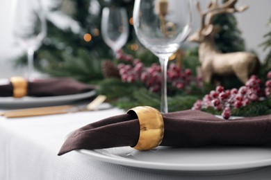Photo of Beautiful festive table setting with Christmas decor, closeup. Space for text