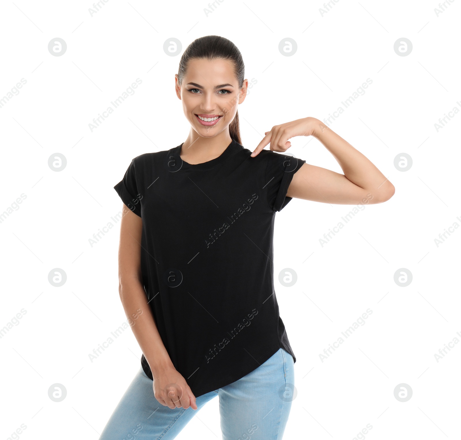 Photo of Young woman in t-shirt on white background. Mockup for design