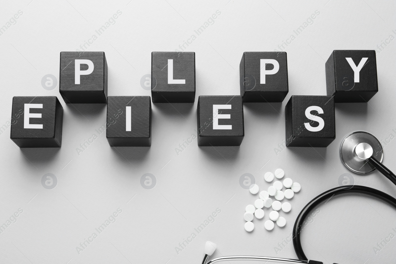 Photo of Flat lay composition with word Epilepsy on light grey background