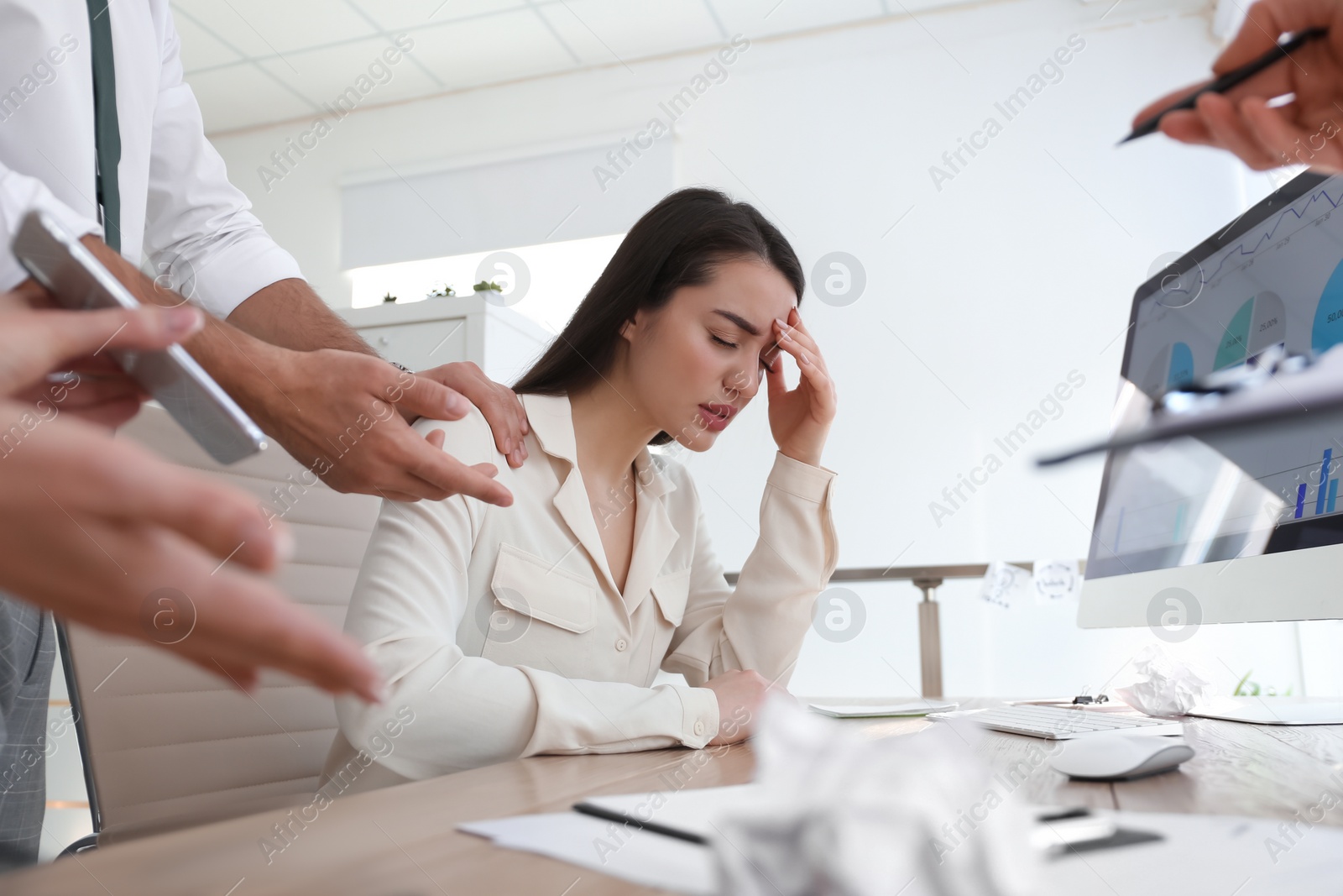 Photo of Businesswoman stressing out at workplace in office