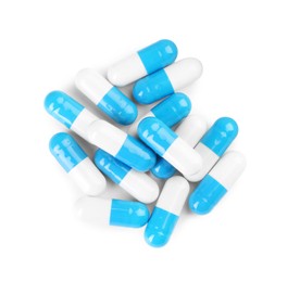 Photo of Pile of antibiotic pills isolated on white, top view