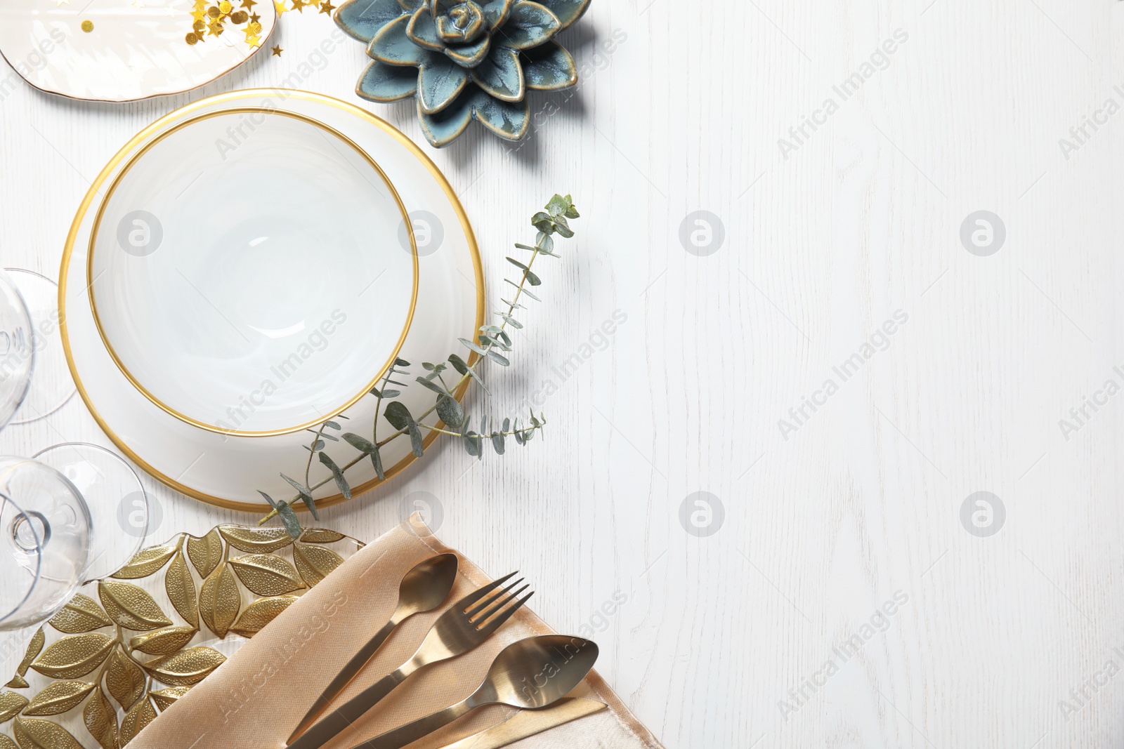 Photo of Elegant table setting and space for text on light background, top view