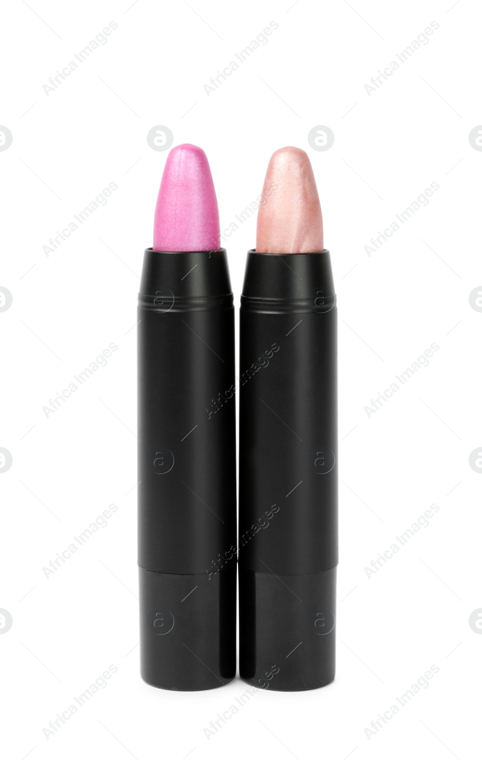 Photo of Colorful lipsticks in black tubes isolated on white