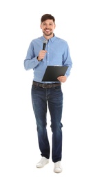 Handsome man with microphone and clipboard on white background