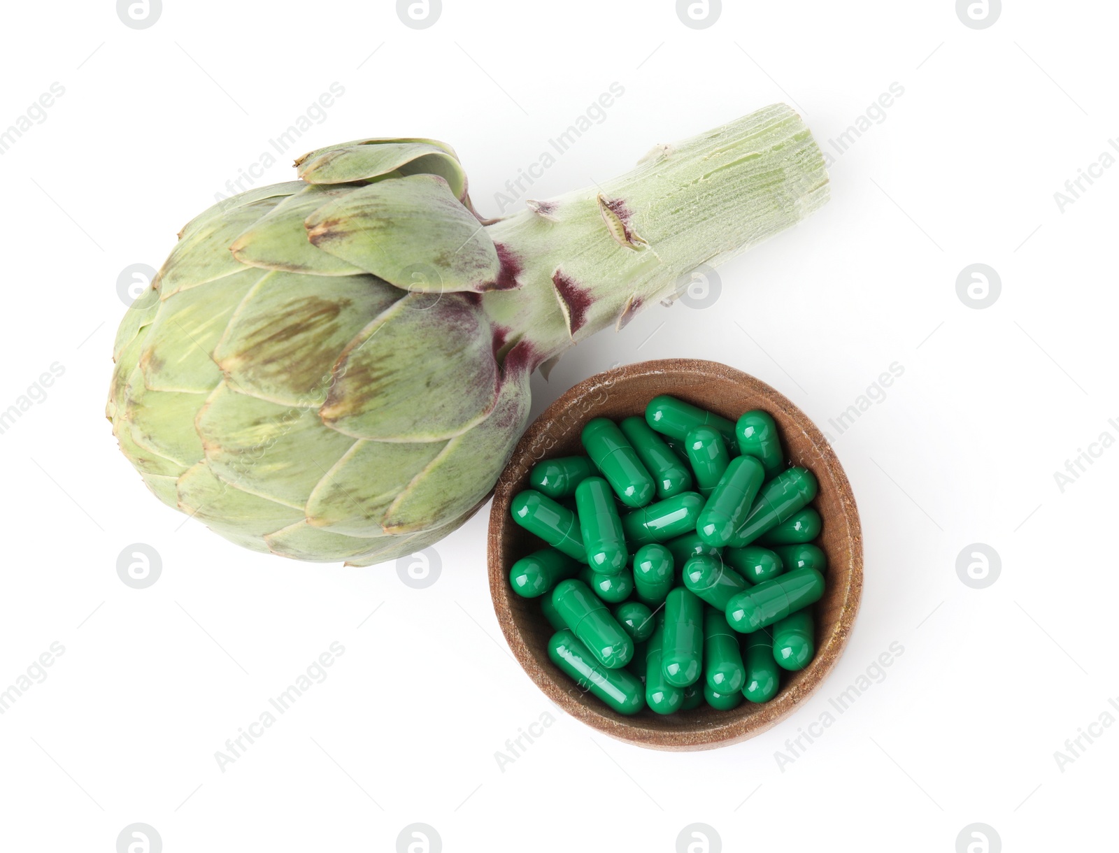 Photo of Fresh artichoke and pills isolated on white, top view