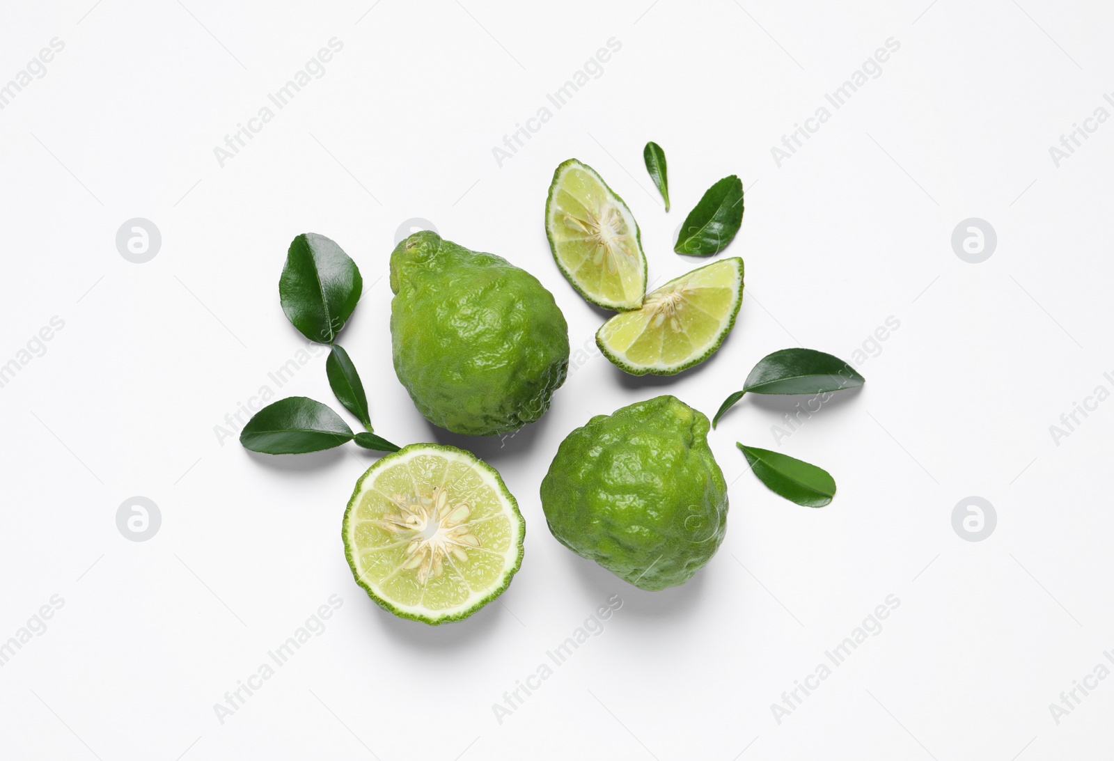 Photo of Flat lay composition with ripe bergamot fruits on white background