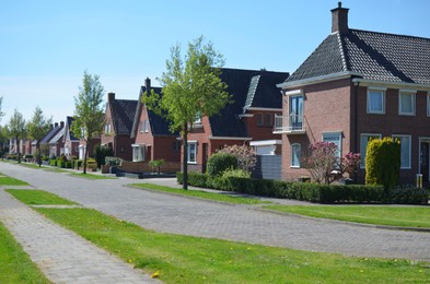 Block of houses on sunny day. Suburban district