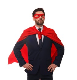 Photo of Confident businessman wearing red superhero cape and mask on white background