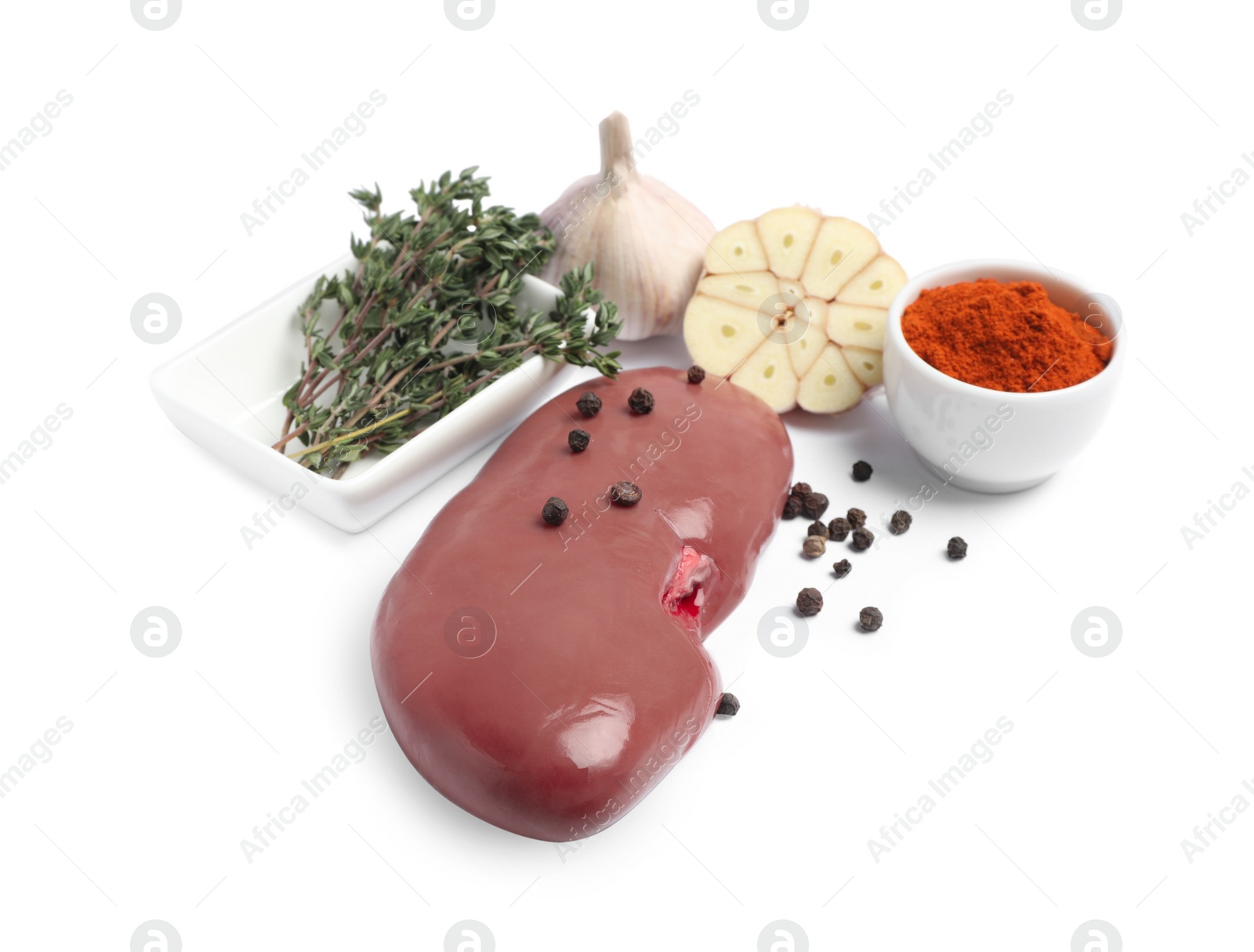 Photo of Fresh raw pork kidney with spices on white background