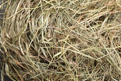Pile of dried hay as background, top view
