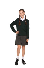 Teenage girl in stylish school uniform on white background