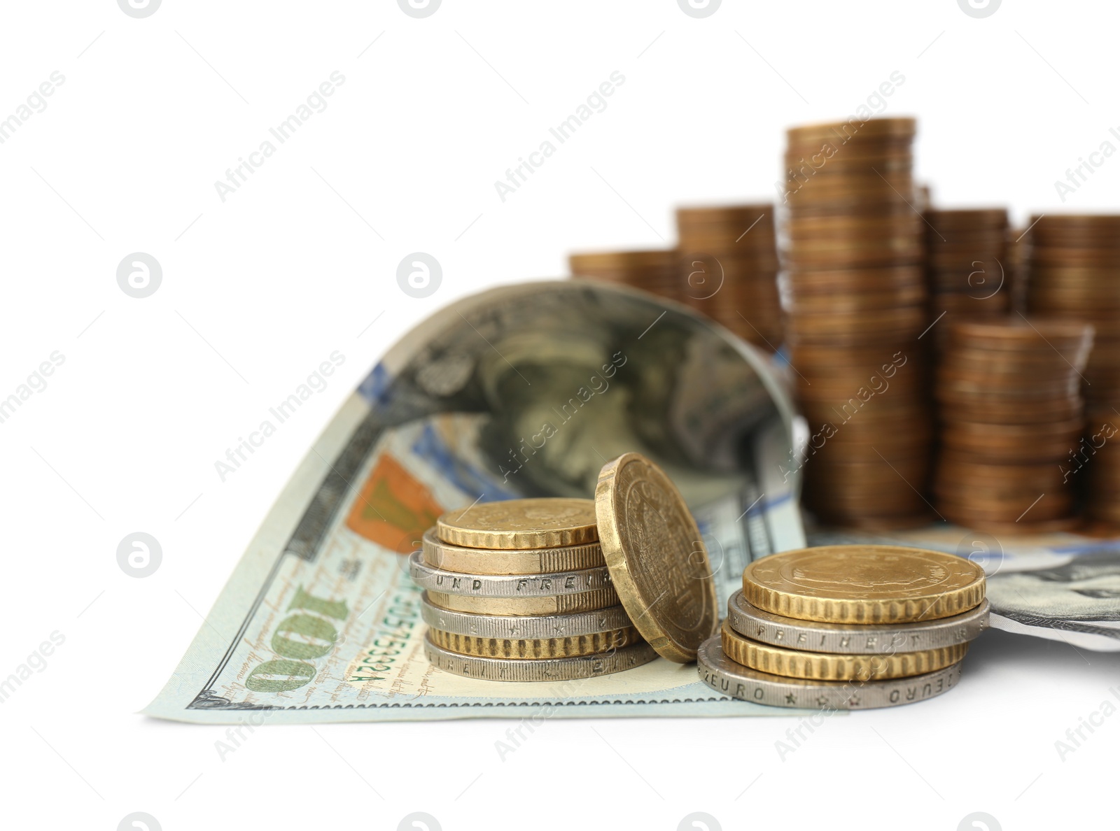 Photo of Dollar bills and coins on white background