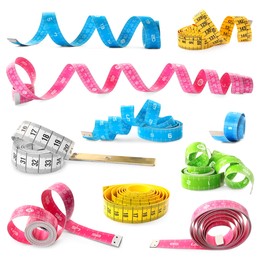 Image of Set with different measuring tapes on white background