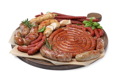 Different delicious sausages with herbs on white background. Assortment of beer snacks