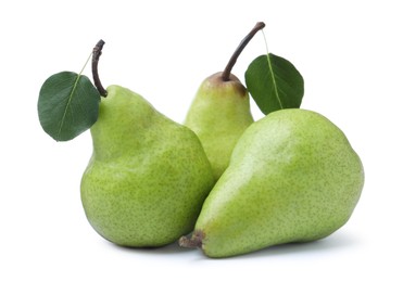 Photo of Fresh ripe pears with green leaves on white background