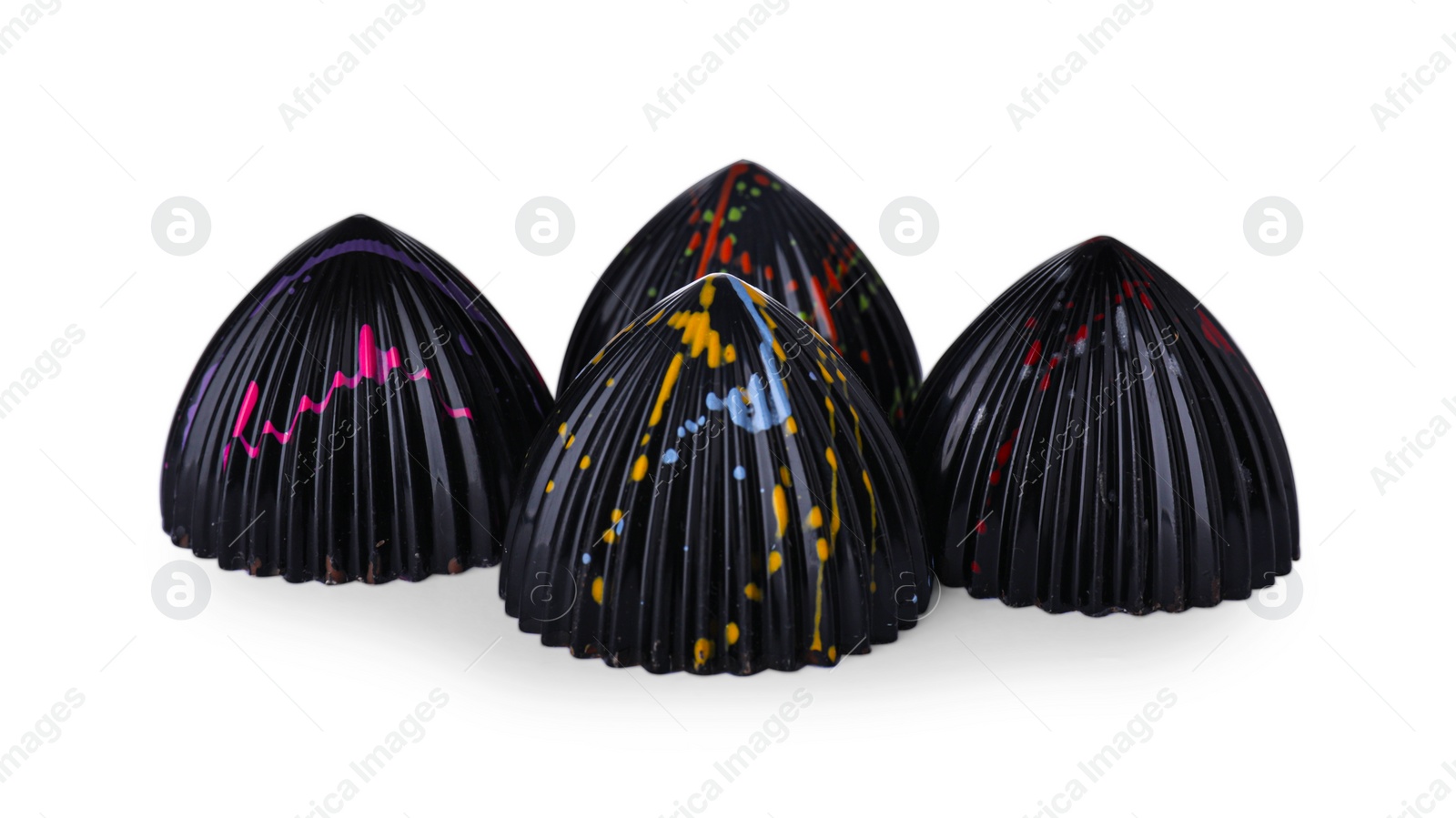 Photo of Many tasty chocolate candies on white background