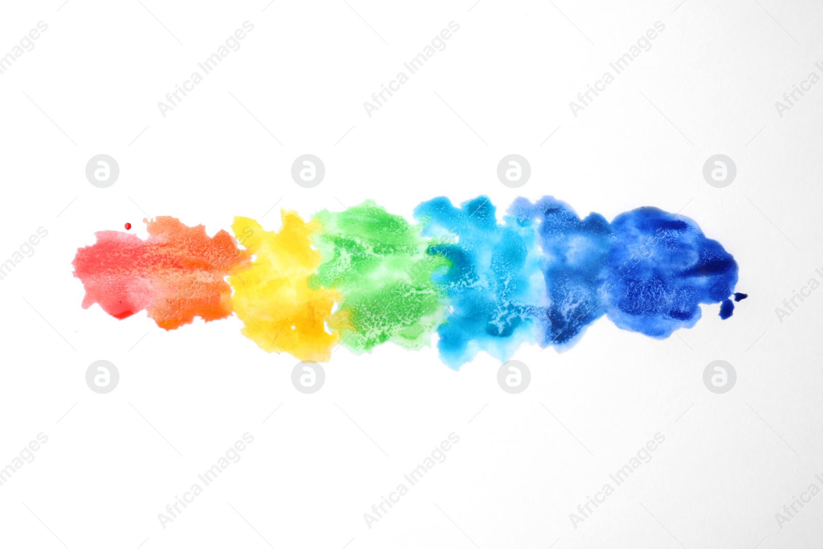 Photo of Rainbow drawing with watercolor paint on white paper, top view