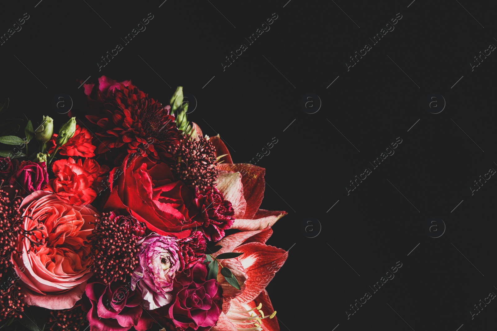 Photo of Beautiful bouquet of different flowers on black background, space for text. Floral card design with dark vintage effect