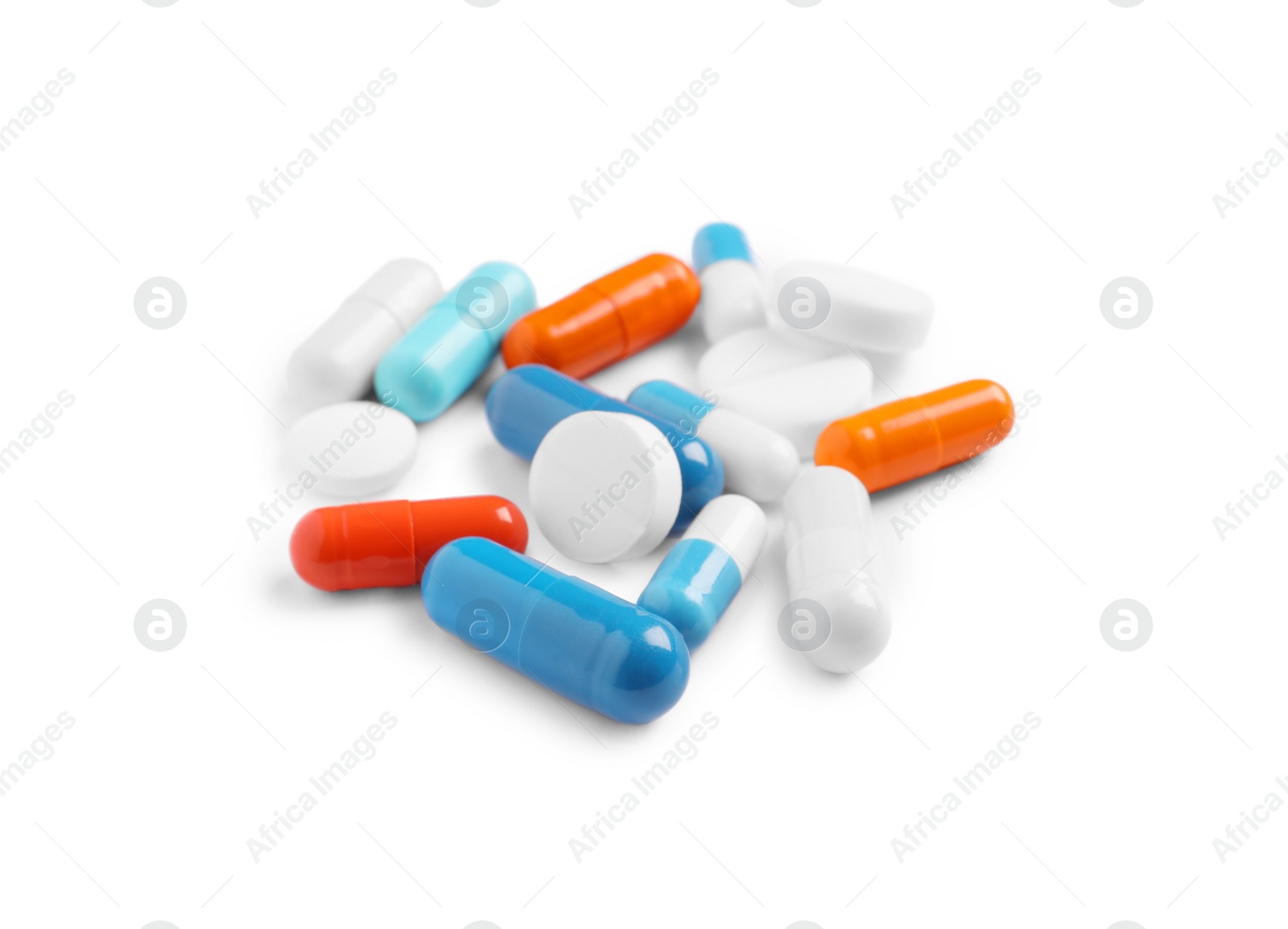 Photo of Many different pills isolated on white. Medicinal treatment