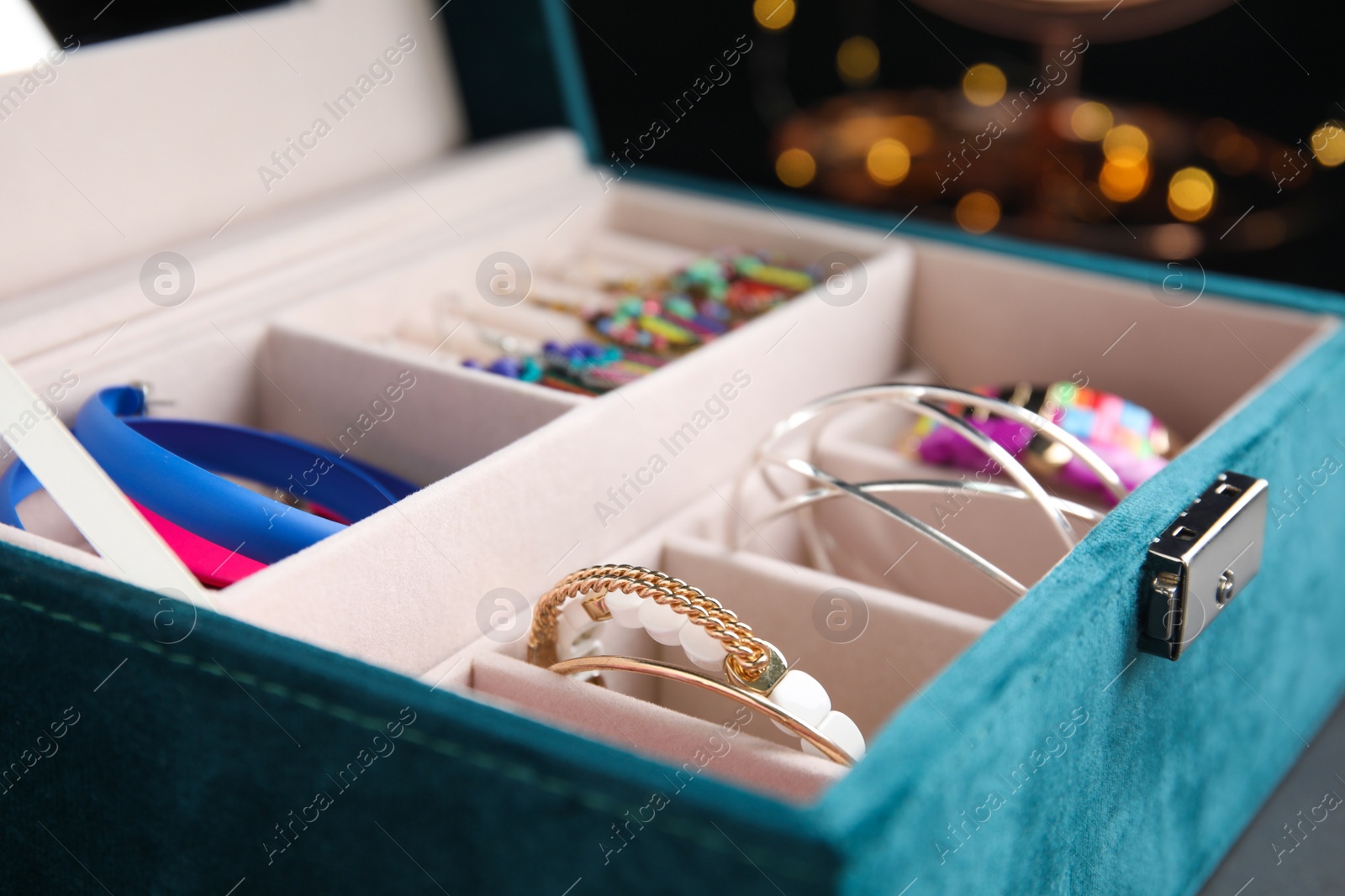 Photo of Elegant jewelry box with beautiful bijouterie, closeup