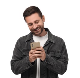 Happy man sending message via smartphone on white background