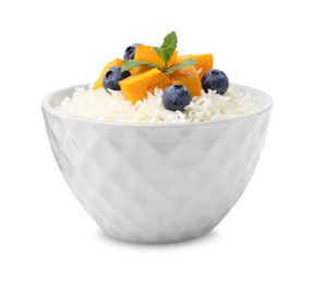 Photo of Bowl of delicious rice porridge with blueberries and pumpkin isolated on white