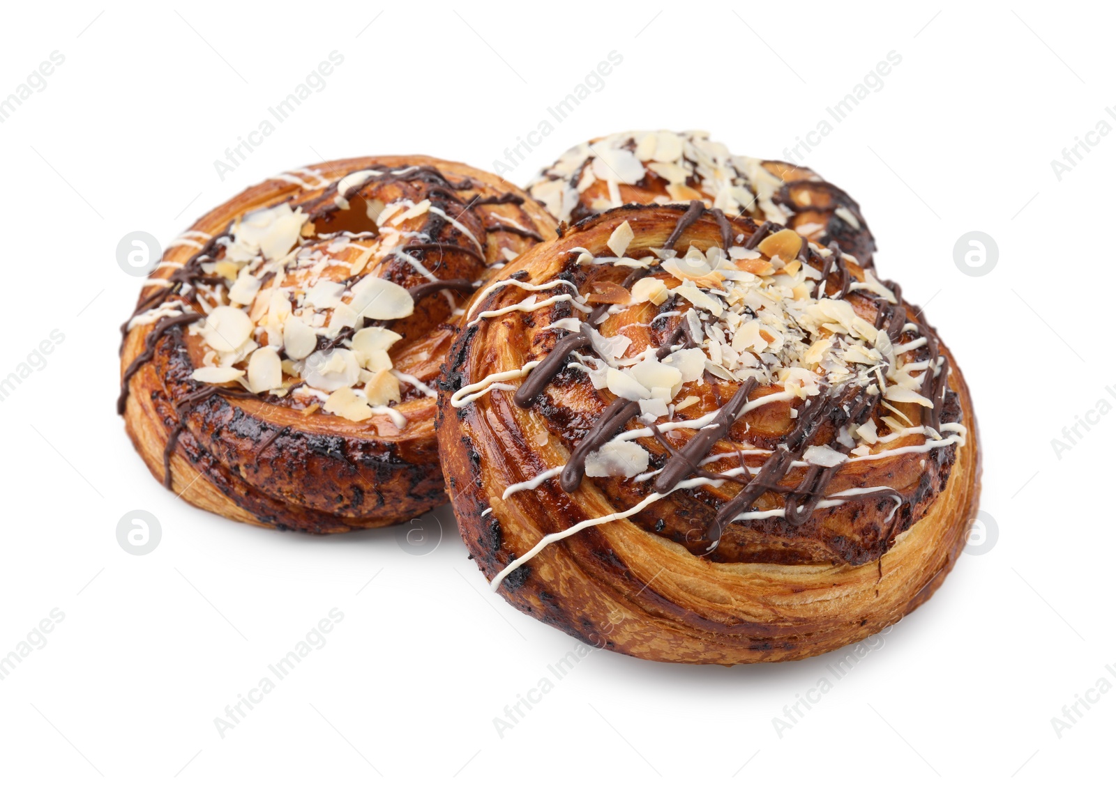 Photo of Delicious rolls with almond and toppings isolated on white. Sweet buns