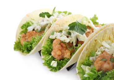 Photo of Yummy fish tacos in holder isolated on white, closeup