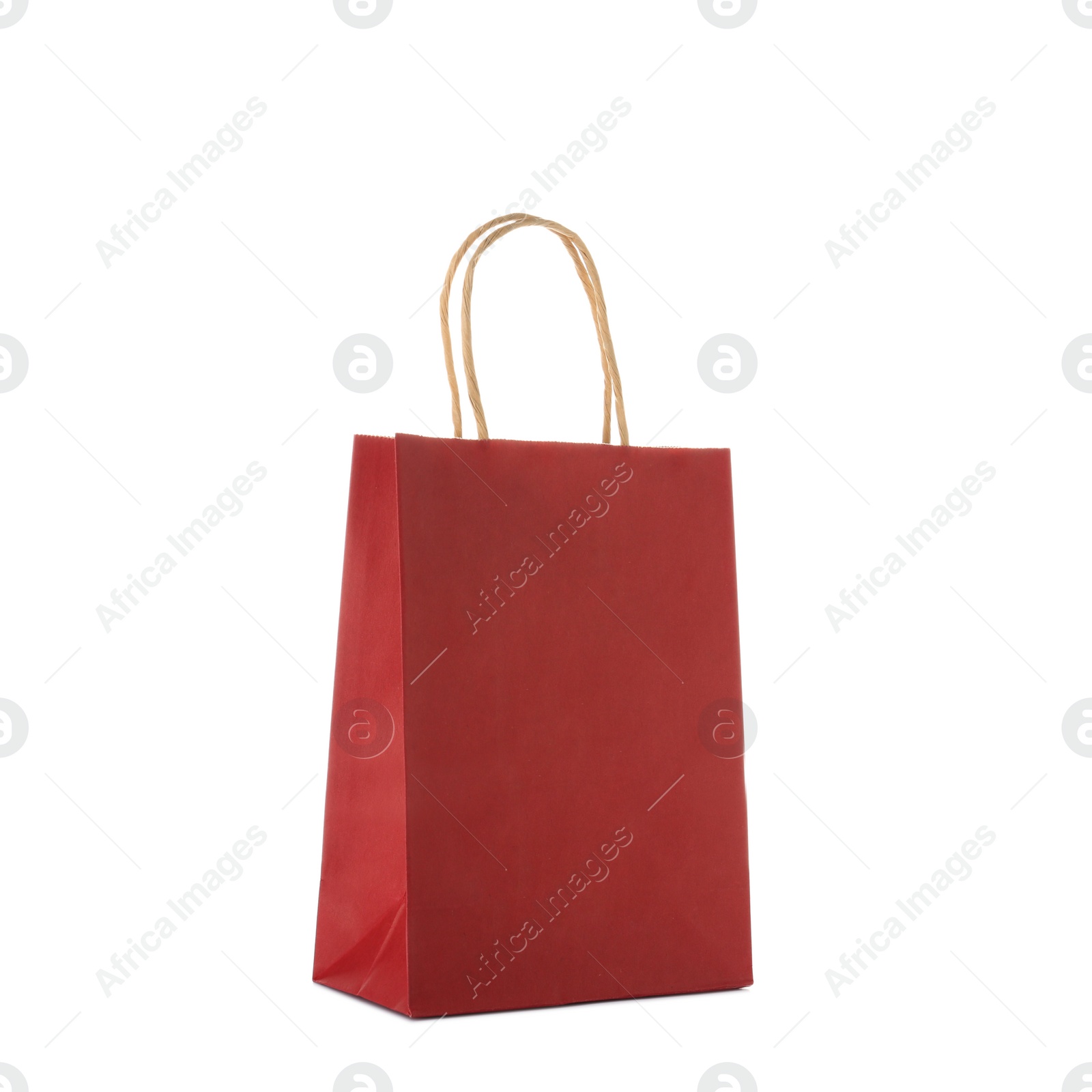 Photo of Mockup of paper shopping bag on white background