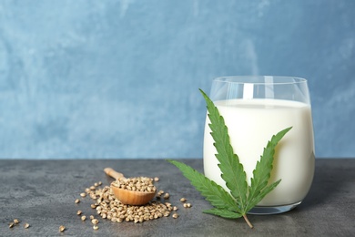 Composition with hemp milk and space for text on color background