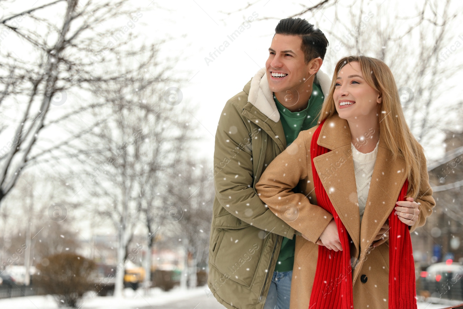 Photo of Beautiful happy couple outdoors on winter day