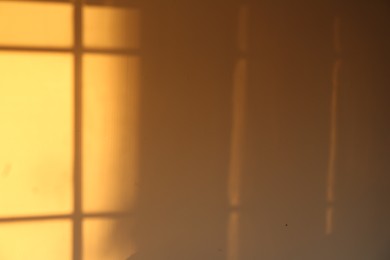 Photo of Light and shadow from window on wall