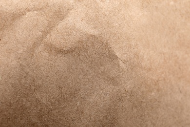 Photo of Brown paper bag texture as background, top view