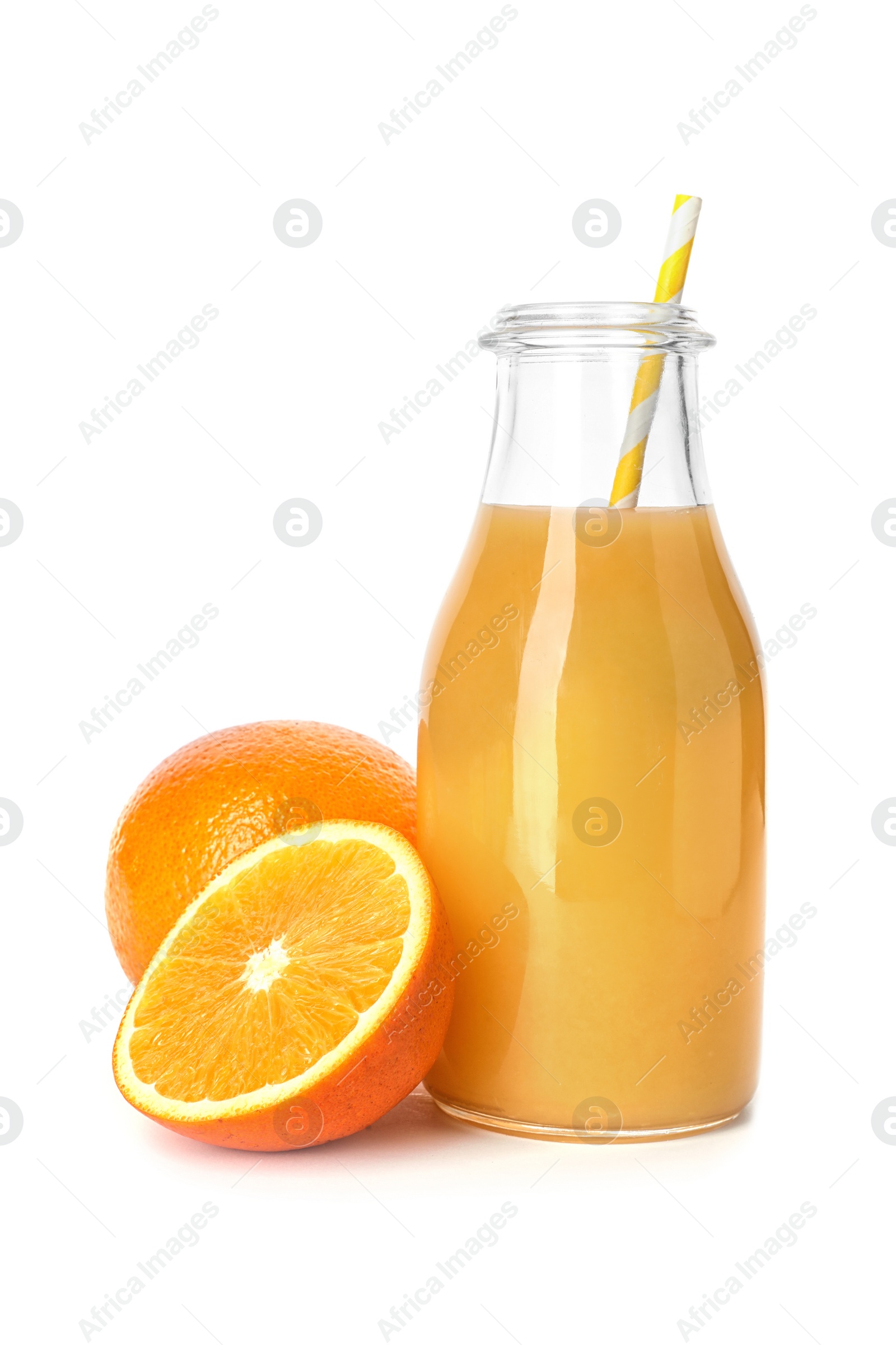 Photo of Glass bottle of orange juice and fresh fruit isolated on white