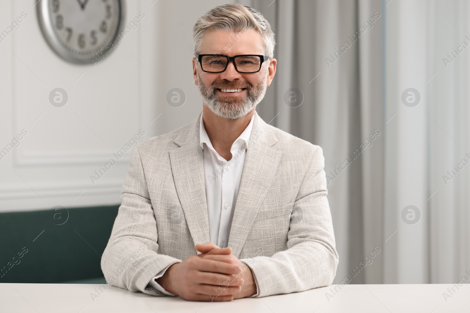 Photo of Happy man having video call at home, view from web camera