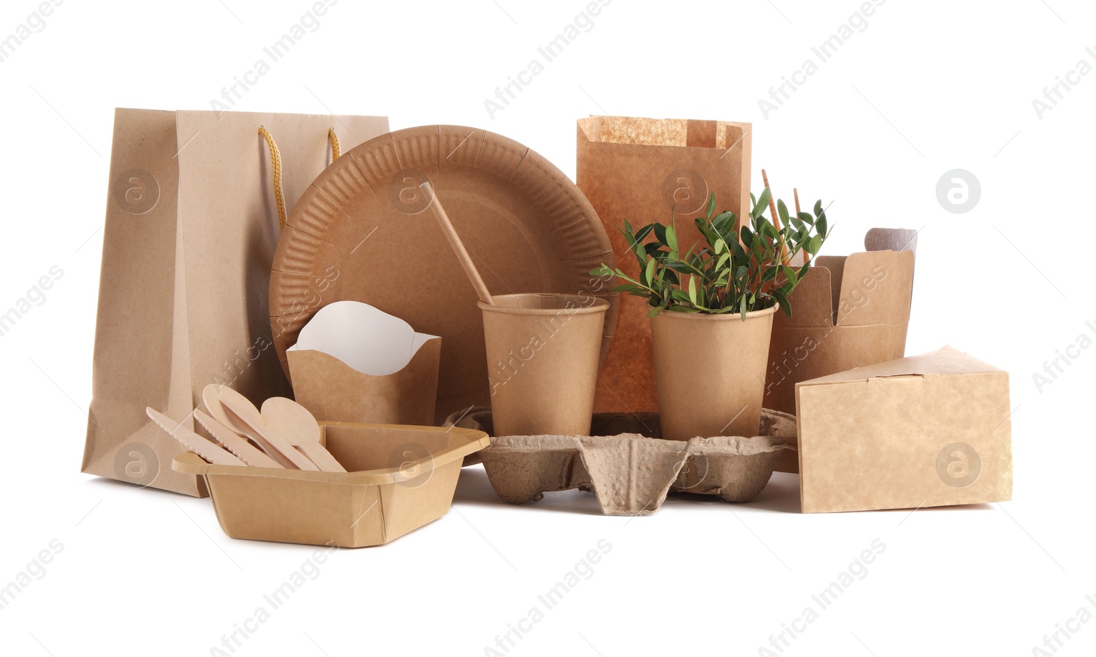 Photo of Eco friendly food packagings, tableware, paper bags and twigs isolated on white