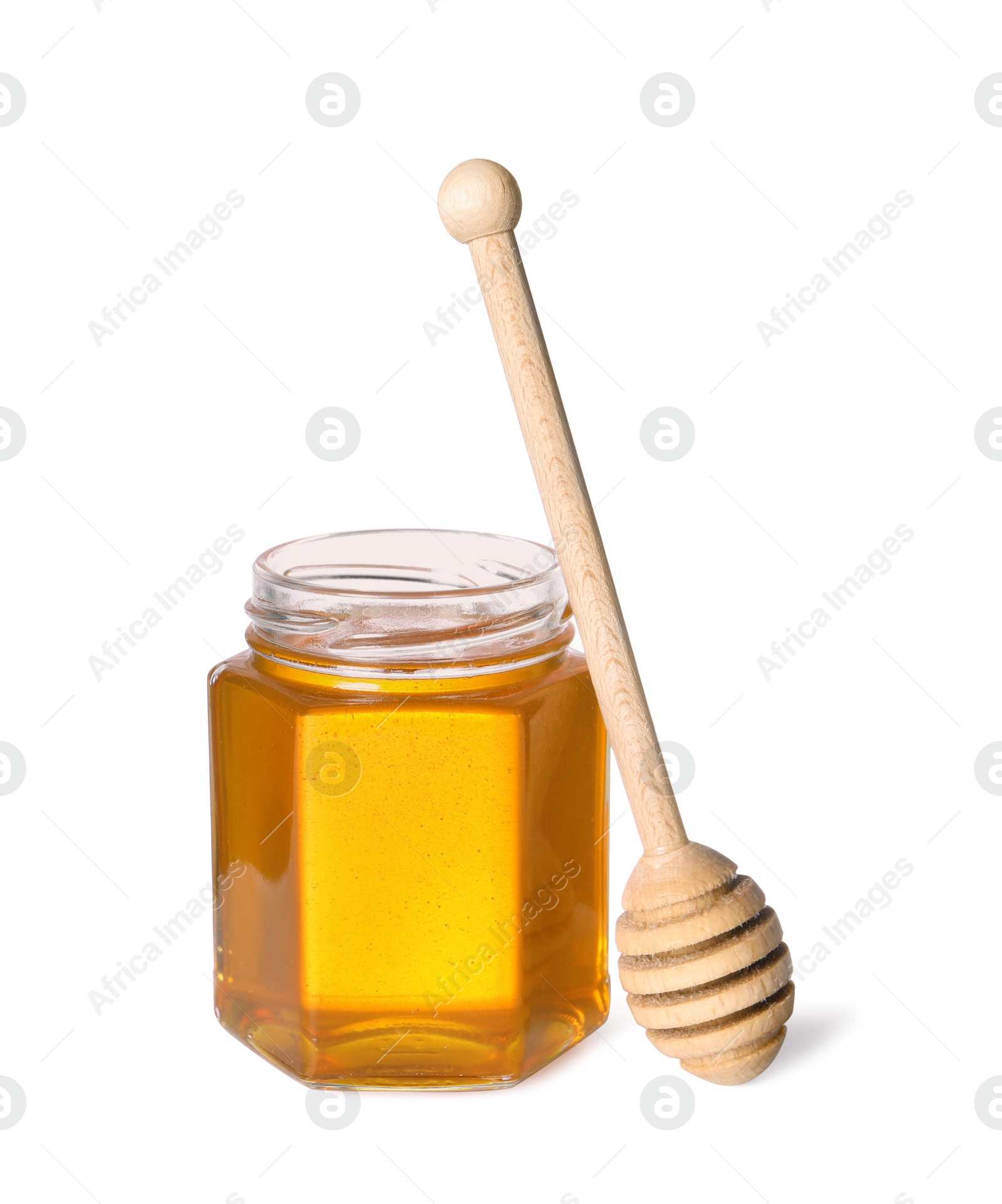 Photo of Tasty natural honey in glass jar and dipper isolated on white