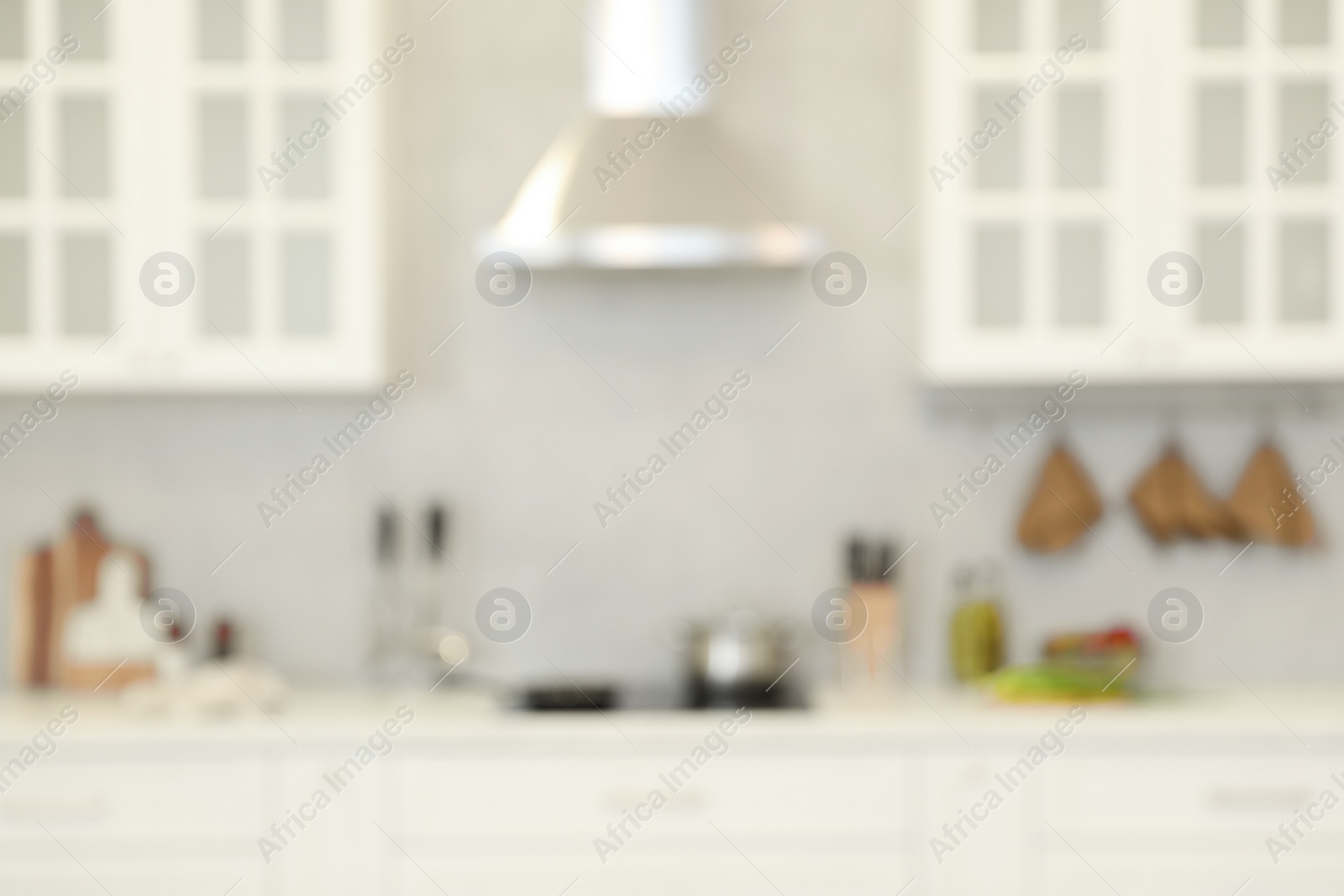 Photo of Blurred view of modern kitchen. Interior design