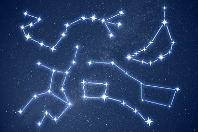 Set with different constellation stick figure patterns in starry night sky